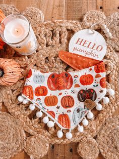 an orange and white bandana with pumpkins on it