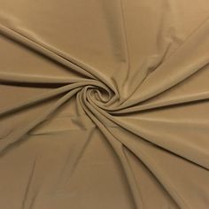 a close up view of a tan fabric