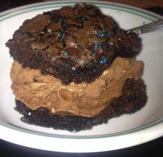 a chocolate cookie dessert on a plate with a fork