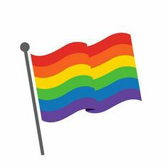 a rainbow flag waving in the wind