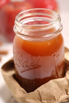 easy apple pie moonsshine recipe in a mason jar with text overlay that reads easy apple pie moonshine