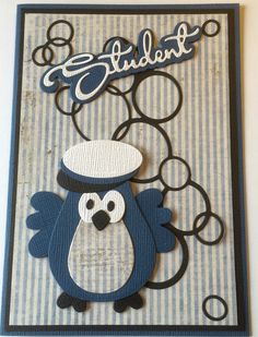 a blue and white card with a penguin on it