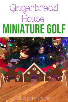 the gingerbread house miniature golf game is on display in front of a christmas tree