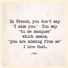 an old typewriter with the words in french, you don't say i miss you