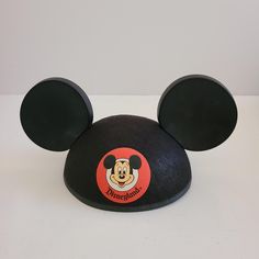 Youth size collectible Mickey Mouse ears hat from Disneyland embroidered name Bob on back, if it was worn it wasn't for long. Ships boxed to preserve shape. Disneyland Mickey Mouse, Mickey Mouse Ears Hat, Ears Hat, Mickey Mouse Hat, Mickey Mouse Ears, Ear Hats, Mouse Ears, Skull Cap, The Back