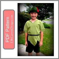 a little boy dressed up as peter the red - nosed elf for halloween, standing in front of a yard