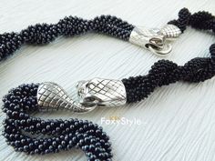 black snake necklace metalic necklace unisex necklace black gift men necklace beaded black necklace gothic necklace gray gift idea unisex *This is a unique handmade snake necklace from seed beads, high quality cotton thread in black and metalic grey tones with snake head and tail clasp (jewellery hypoallergenic aluminum) is very flexible and comfortable to wear. This snake jewelry could be lovely accessorize for your look every day, or special evening. This snake necklace also is a perfect acces Black Snake Shape Necklace For Gift, Black Snake Necklace For Gift, Black Snake Necklace For Gifts, Black Snake Shape Necklace Gift, Adjustable Metal Snake Shape Necklaces, Black Snake-shaped Necklaces As Gift, Handmade Black Snake-shaped Jewelry, Luxury Handmade Snake-shaped Necklace, Heads And Tails