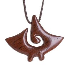 In the shape of a manta ray the pendant of this necklace is hand-carved from beautiful natural estoraque wood decorated with an open swirl pattern. Costa Rican artisan Milagro Cascante creates this nautical bohemian necklace which circles the neck with an adjustable length of cotton cord. Cotton Necklace, Costa Rican, Manta Ray, Buy Wood, Wood Necklace, Sliding Knot, Bohemian Necklace, Wood Pendant, Swirl Pattern