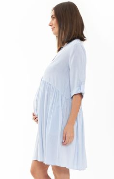 Drift into warmer weather with our relaxed-fitting Samantha Stripe Maternity Dress. This shirt dress with all-over stripe print, cuffed elbow length sleeves, an empire seam, and gathered skirt can be buttoned down, or worn open as a duster over your swimsuit or shorts. It’s the easiest throw-on-and-go dress for expecting mothers, and has easy nursing access using the buttons. Striped Maternity Shirt Dress Relaxed fit Yarn dyed woven Viscose Button up front is nursing friendly Elbow length sleeve Nursing Dress Breastfeeding, Maternity Boutique, Maternity Stores, Breastfeeding Clothes, Cute Maternity Outfits, Bra Dress, Party Kleidung, Post Pregnancy