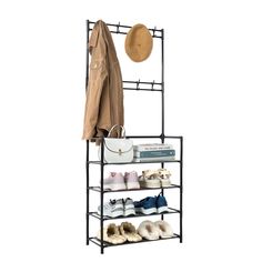 an iron rack with shoes, umbrella and hat on it's top shelf in front of a white background