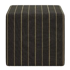 a black and gold striped ottoman