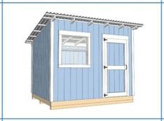 a small shed with the door open and windows on it's side, next to a