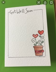 a card with a potted plant and hearts on it that says get well soon