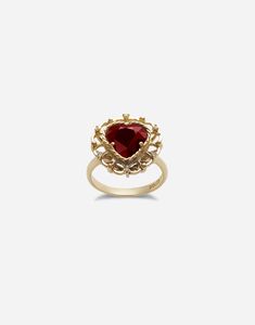 Technical specifications: Gold 18 Kt. Gemstones: 1 heart-shaped red rhodolite garnet, 6 brilliant-cut colourless sapphires. Made in Italy Classic Heart-shaped Ruby Ring For Formal Occasions, Yellow Gold Heart-shaped Ruby Ring, Elegant Red Heart Ring In 14k Gold, Heart-shaped Yellow Gold Ruby Ring, Heart Shaped Ruby Ring In Yellow Gold, Heart-shaped Ruby Ring In Yellow Gold, Luxury Heart Cut Ruby Ring, Elegant Red 14k Gold Heart Ring, Ruby Rings For Valentine's Day Formal Occasions