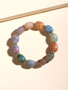 Crystal Beaded Bracelet Casual Multicolor Jewelry With Spacer Beads, Casual Multicolor Bracelets With Large Beads, Casual Multicolor Spacer Beads Jewelry, Casual Multicolor Large Beaded Bracelets, Multicolor Faceted Oval Beads Bracelets, Multicolor Bracelets With Faceted Oval Beads, Casual Gold Beaded Bracelets With Gemstone, Casual Crystal Bangle Bracelet, Casual Multicolor Beaded Bracelets With Large Beads