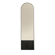 an oval mirror with black and white trim on the bottom, against a white background