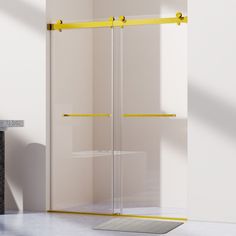 an empty room with a shower and yellow bars on the door handle, in front of a white wall