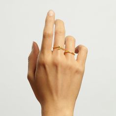 This dainty ring is perfect for stacking with other rings or worn alone for a minimalistic look. Perfect for any occasion. P R O D U C T • I N F O ✅ Materials: 925 sterling silver ✅ Finishing: Silver, 18k Gold or Rose Gold. ✅ Product comes with beautiful packaging ✅ Product is safe for sensitive skin. Minimalist Adjustable Round Band Rings, Adjustable Minimalist Round Band Rings, Dainty Stackable Rings Tarnish Resistant, Dainty Tarnish-resistant Round Stackable Rings, Dainty Tarnish-resistant Stackable Rings, Minimalist Yellow Gold Stackable Rings For Promise, Minimalist Yellow Gold Stackable Promise Rings, Dainty Stackable Initial Ring With Open Design, Dainty Stackable Initial Open Ring