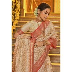 Cream & Peach colored saree is made from banarasi silk fabric which is highlighted with beautiful floral weaving work as shown. comes along unstitched banarasi silk blouse piece which you can customise as per your design/style. Occasion - You can buy this saree for festive and functions. Note:- The actual product may differ slightly in color and design from the one illustrated in the images when compared with computer or mobile screen. Measurements: Saree : Banarasi Silk : 5.5 Mtrs Blouse : Bana Peach Blouse Piece With Pallu For Navratri, Peach Zari Work Saree For Navratri, Navratri Peach Blouse Piece With Pallu, Peach Unstitched Blouse Traditional Wear For Diwali, Peach Unstitched Blouse For Diwali, Diwali Peach Saree With Zari Work, Unstitched Peach Saree Traditional Wear, Peach Unstitched Saree Traditional Wear, Art Silk Saree With Dupatta In Peach