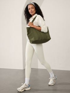 FOR: Commuting, work, and travel FEEL: Natural canvas is lightweight and durable FAVE: Comfort-first strap design for carrying any weight One size. Bag Campaign, Logo Tote Bag, Gym Tote, Work And Travel, Bra Dress, Summer Is Here, Sporty Outfits, Strap Design, Swim Accessories