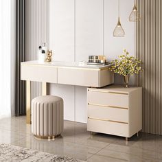 a dressing table and stool in a white room with gold accents on the mirror wall