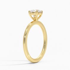 Perfect Fit Solitaire Engagement Ring - 18K Yellow Gold. This elegant solitaire ring features a raised gallery that allows any wedding band to sit flush for a perfect fit. The petite band adds to the sleek, classic look of this design. 
 
 Our perfect fit engagement rings are carefully designed to sit flush against a variety of wedding rings for a seamless look with no gaps. Elegant Solitaire Halo Ring For Anniversary, Timeless Round Single Diamond Wedding Ring, Modern Stackable Rings For Promise, Modern 14k Gold Solitaire Wedding Ring, Refined Single Diamond Ring For Anniversary, Modern Solitaire Stackable Rings For Promise, Timeless Solitaire Halo Ring With Round Band, Timeless 14k Gold Ring With Classic Cut, Classic Promise Rings With Round Band