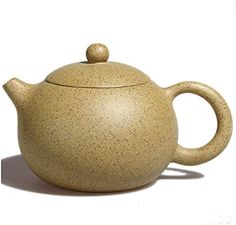 a teapot with a lid is shown on a white background and has the measurements for it