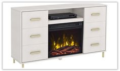 a white entertainment center with a fire in the fireplace