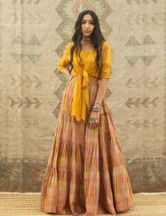 #ethnicwear #ethnic #traditional #traditionaldress #indianwear #suit #blouse #outfit #indianoutfit #outfitideas #stylingtips #stylingideas Mustard Lehenga, Label Anushree, Knotted Shirt, Blouse Designs High Neck, Indian Outfits Lehenga, Long Skirt Outfits, Kurta Designs Women, Designer Party Wear Dresses, Party Wear Indian Dresses