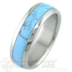 a ring with blue and white marble inlay