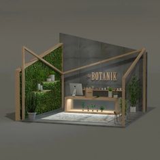 an exhibit booth designed to look like a pottank with plants growing on it