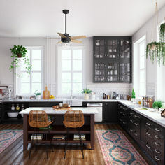 a kitchen with wooden floors and black cabinets