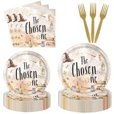 the chosen one party plates and forks are set up on top of each other,