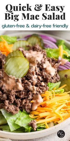 a close up of a plate of food with lettuce and cheese