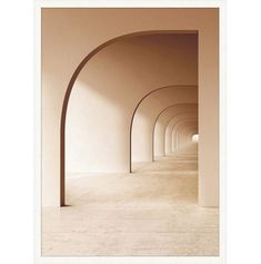 an empty hallway with arches leading to the light at the end is framed in white paper