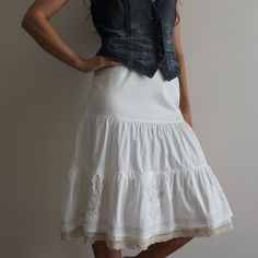 White Skirt Midi Skirt Embroidered Skirt Lace Trim Skirt Tiered Skirt Summer Skirt Lined Fit size: Small Model is 5.77 ft (176 cm) tall, she normally wears size S/M Measurements(lying flat): Waist(elastic): 11"/ 28 cm Length: 27"/ 68.5 cm Please check measurements to insure a proper fit. Remember to allow yourself some extra room for movement. You can compare these with something from your closet that fits you well. Condition: Great Vintage Condition SHIPPING: * I ship worldwide via Priority mai Bohemian Fitted Midi Dress, Cotton Mini Skirt For Daywear, Fitted Cotton Daywear Skirt, Fitted Cotton Skirt For Daywear, Cotton Fitted Skirt For Daywear, Embroidered Skirted Bottoms For Summer, Embroidered Summer Skirt, Stretch Cotton Ruffled Skirt, Relaxed Cotton Skirt With Embroidery