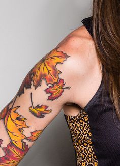 a woman with a tattoo on her arm