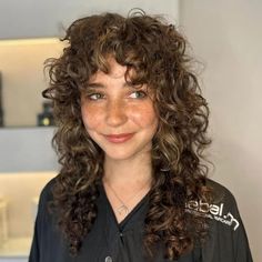 30 Best Curly Wolf Cut Ideas | HairAide Wolf Curly Haircut, Long Curly Wolf Cut, Wolf Cut Hair Curly, Curly Hair Wolf Cut, Curly Wolf Cut Long, Wolf Cut Curly Hair, Curly Hair 2c, Shaggy Curly Hair