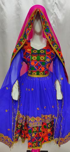 afghan kuchi traditional wedding drees  is made of good quality long lasting fabric. Traditionally such Afghanistan Persian Pashtun new design frocks are used as bridal dress. Most of girls also like and recommend such dresses for wedding, Nikkah and Mehndi night events. The dress measurements are kept average. If you need this frock in exact measurements you need, then please  send us measurements which best fit on your body Anarkali Dress With Embroidered Dupatta, Blue Semi-stitched Dress For Traditional Ceremonies, Bollywood Style Multicolor Dabka Work Gown, Blue Dabka Dress For Traditional Ceremonies, Wedding Dress With Multicolor Embroidery And Mirror Work, Traditional Semi-stitched Dress With Mirror Work, Bohemian Multicolor Embroidered Anarkali Set For Wedding, Bohemian Floor-length Anarkali Set With Dabka Work, Traditional Multicolor Resham Embroidered Gown