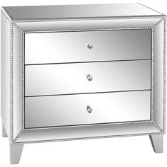 a mirrored nightstand with three drawers