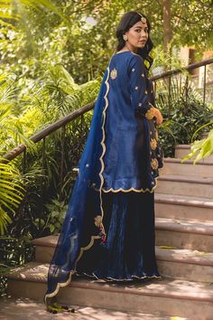 Navy blue banarasi chanderi kurta with marori and lace patchwork embroidery. Paired with scallop edge embroidered dupatta and crushed sharara. - Aza Fashions Designer Jamawar Sharara With Dupatta, Designer Sharara With Dupatta In Jamawar, Blue Jamawar Wedding Dress, Semi-stitched Banarasi Silk Sharara With Dabka Work, Designer Katan Silk Sets With Dori Work, Katan Silk Sharara With Dabka Work And Straight Kurta, Katan Silk Sharara With Dabka Work, Straight Kurta Sharara With Dupatta In Jamawar, Designer Jamawar Sharara For Diwali