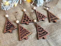 wooden christmas tree ornaments on a table