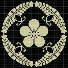 a cross stitch pattern with a four leaf clover in the center and two leaves on each side