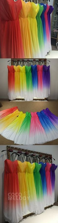 there are many different colored dresses on display