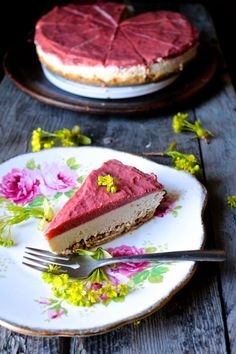 there is a piece of cake on the plate with a fork in front of it