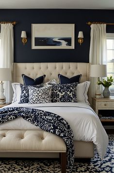 a bedroom with blue walls and white bedding