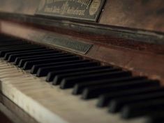 an old piano with the keys missing