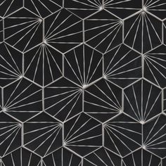 an abstract black and white pattern with lines on the side, as well as small squares