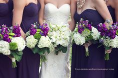 the bridesmaids are holding their bouquets in purple and white colors with pearls on them