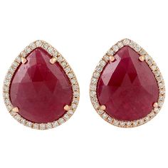 These beautiful stud earrings are meticulously crafted in 18-karat gold. It is hand set in 6.7 carats natural ruby and .26 carats of sparkling diamonds. FOLLOW MEGHNA JEWELS storefront to view the latest collection & exclusive pieces. Meghna Jewels is proudly rated as a Top Seller on 1stDibs with 5 star customer reviews. All items manufactured by us are handmade and can be customized or redesigned. Composition Size-13X11 MM Total Weight-4.25 Gold Weight(Gms)-2.858 Diamond Wt(Cts)-0.26 Ruby Wt(Ct Beautiful Stud Earrings, Ruby Diamond, Natural Ruby, Sparkle Diamonds, Jewelry Earrings Studs, Pear, Ruby, 18k Gold, Gemstone Rings